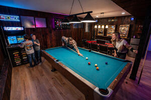 Enjoy a dedicated game room with a pool table