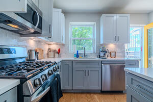 Chef's kitchen with deck access