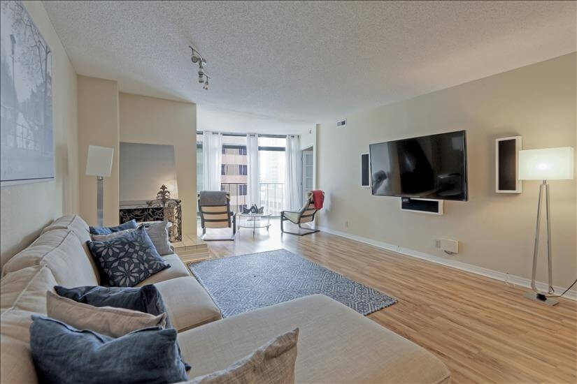 Living room with 65 TV and Premium Speakers