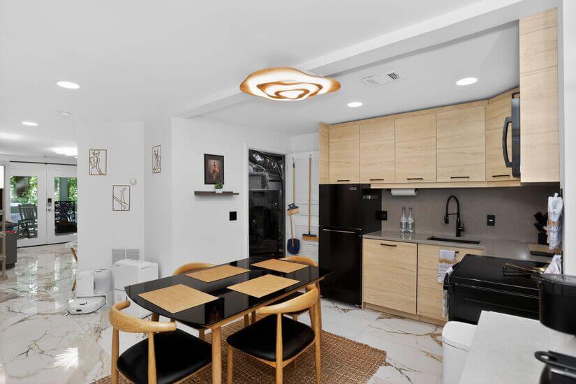 Kitchen overview w/ utility room view