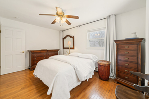 Bedroom with Dresser and Storage View