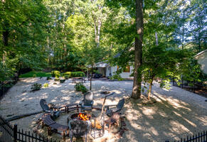 “An in-ground fire-pit overlooking the house