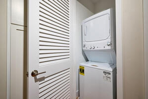 In-home laundry and hallway storage