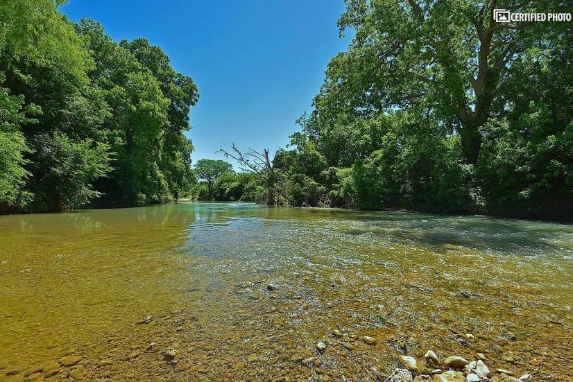 House is Located Along the San Marcos River