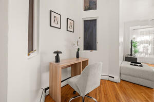 Desk area beside the duplex staircase