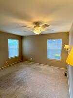 1st floor primary bedroom, 2 windows