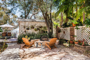 Private Side Yard with Sitting Area Adjacent to the Patio