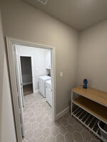 laundry folding table in mudroom