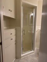 Shower in bathroom for primary bedroom