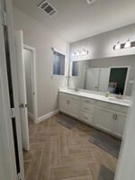 main suite bathroom with ceramic tile