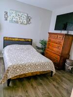 Down stairs bedroom with full bathroom