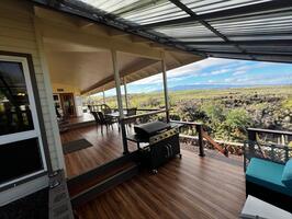 Lanai with gas grill and outdoor dining