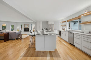 Kitchen fully equipped wi new appliances and marble counters