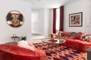 Retro lounge w/round mirror & plush seating