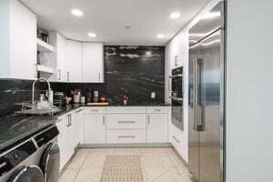 Chef's kitchen with granite and GE Monogram