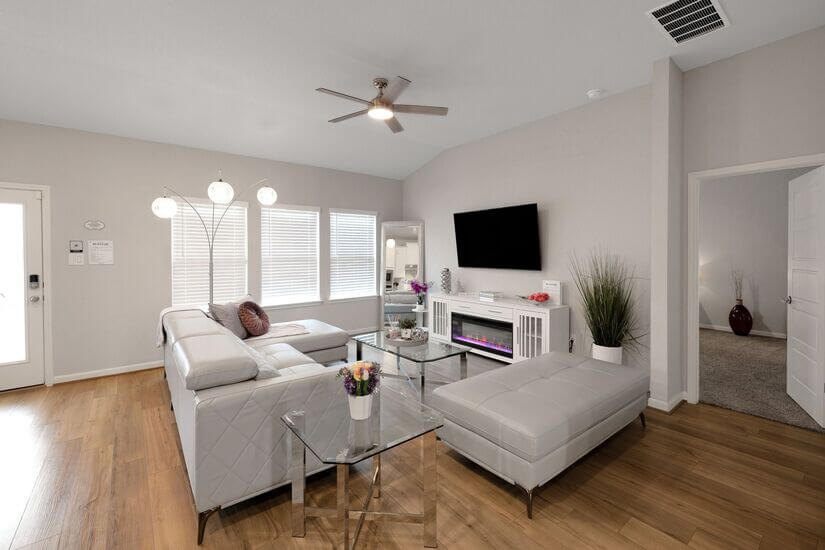 Relax after work with a Smart TV and electric fireplace.