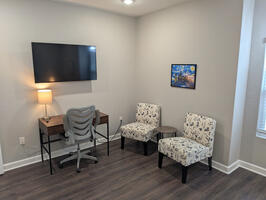 Workspace and sitting area in master bedroom