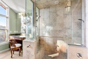 Master shower with steam, dual showers.