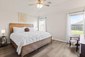 Furnished king primary bedroom