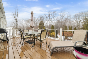 Deck Seating Area with Dining Set and Lounge Chair