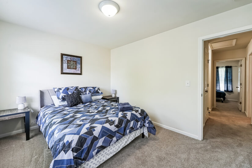Secondary bedroom with queen bed,