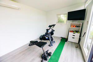 Spin bike, weights and weight bench