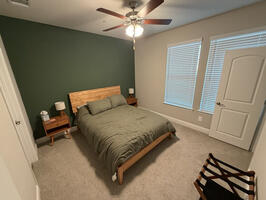 first floor bedroom with walk-in closet