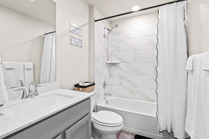 Hall bath with tub and shower