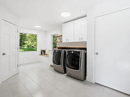 Mud Room / Laundry with high capacity washer and dryer