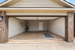 Garage with in-ground storm shelter