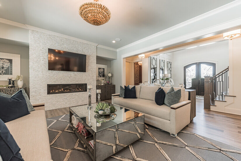 Family Room with modern fireplace and high end finishes