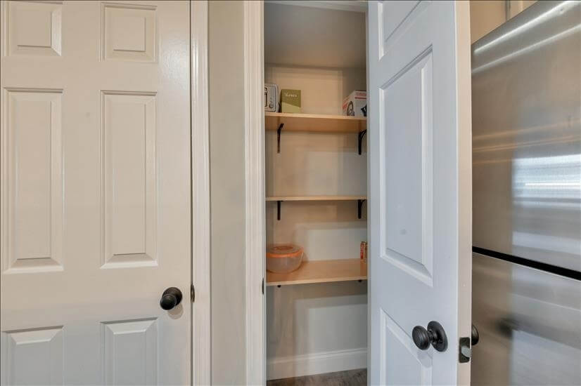 Walk in pantry with lots of shelves