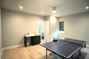 Game lounge and flexible fourth sleeping room
