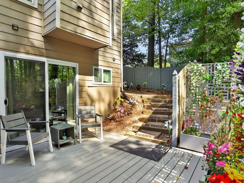Stone walkway to the private entrance in the screened patio