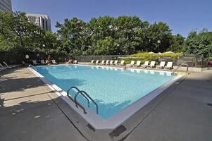 Seasonal outdoor pool for with private changing rooms.