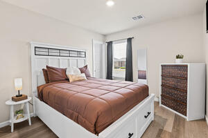 Furnished queen bedroom