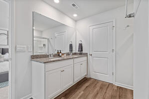 Indulge in luxury with a walk-in shower and double sinks