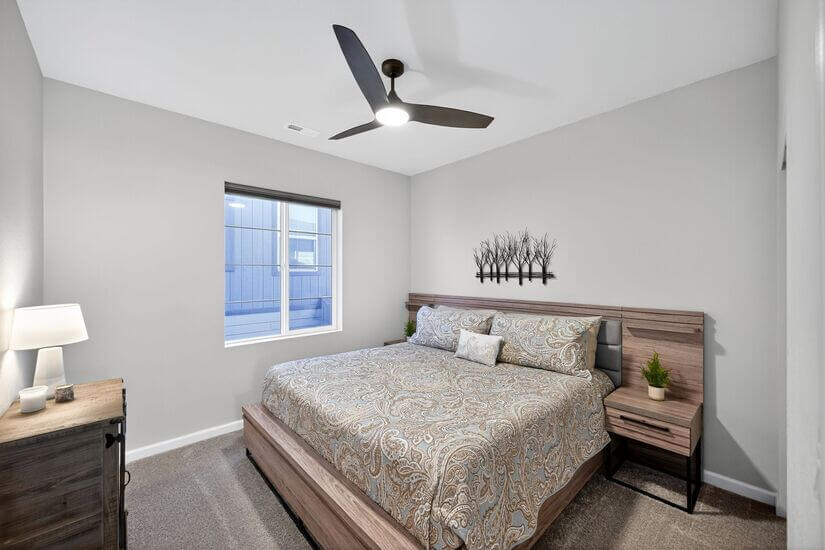Upstairs guest room with King bed and furnishings