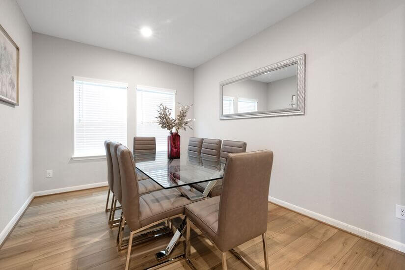 Elegant formal dining room with seating for eight.
