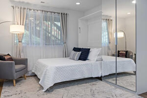 Downstairs bedroom with full size murphy bed.