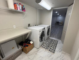 Full size washer and dryer in the lower level