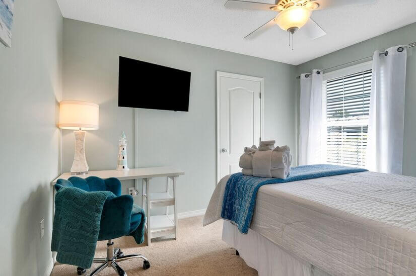 Work desk,swivel comfortable chair and queen bed- bedroom 3