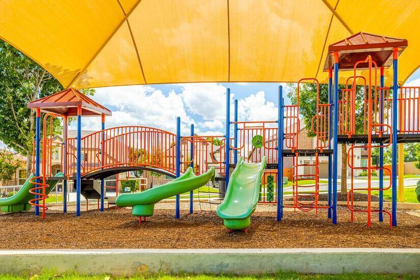 Children playground and walking trails next to the pool.