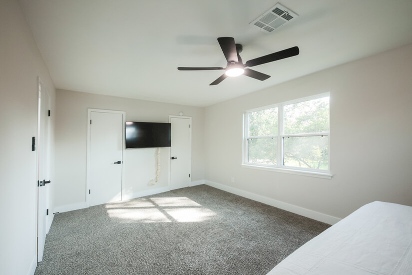 Smart TV and blackout shades for comfort and privacy