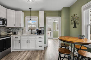 Beautiful Farmhouse on Pond and 40 Acres