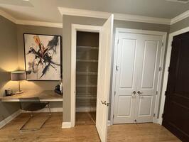 Large double door closet and pantry closet in kitchen