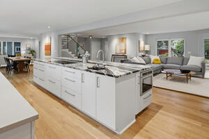 Fully equipped kitchen wi new appliances and marble counters