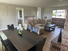 Living room w/ tons of storage.