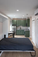 Fully furnished studio layout with Murphy bed