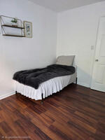 Twin size bed in upstairs bedroom